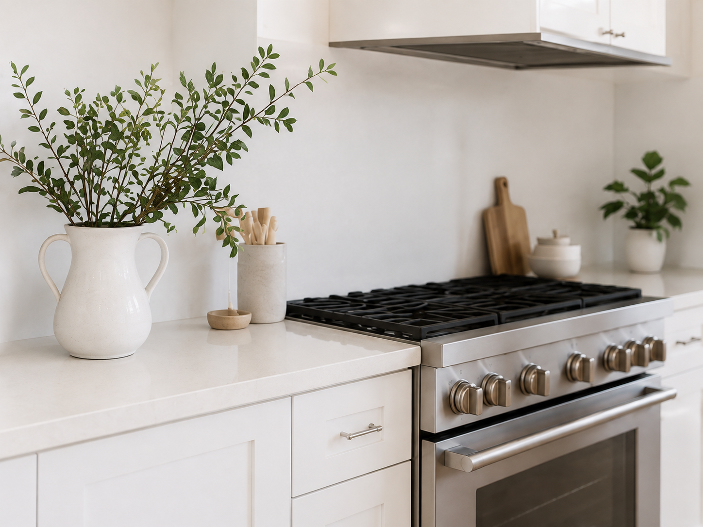 Clean kitchen with wiped countertops and a shining sink